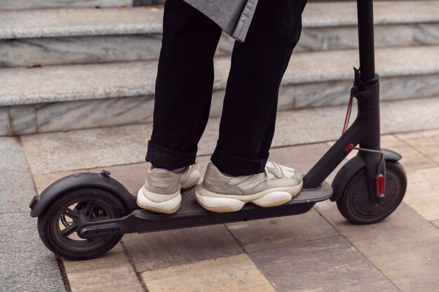 Man riding his electric scooter outdoors