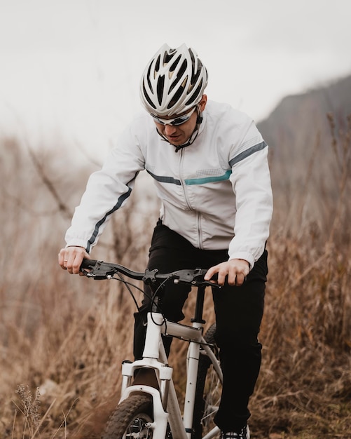 Man riding a mountain bike alone