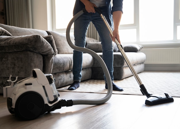 Man servant doing chores around the house