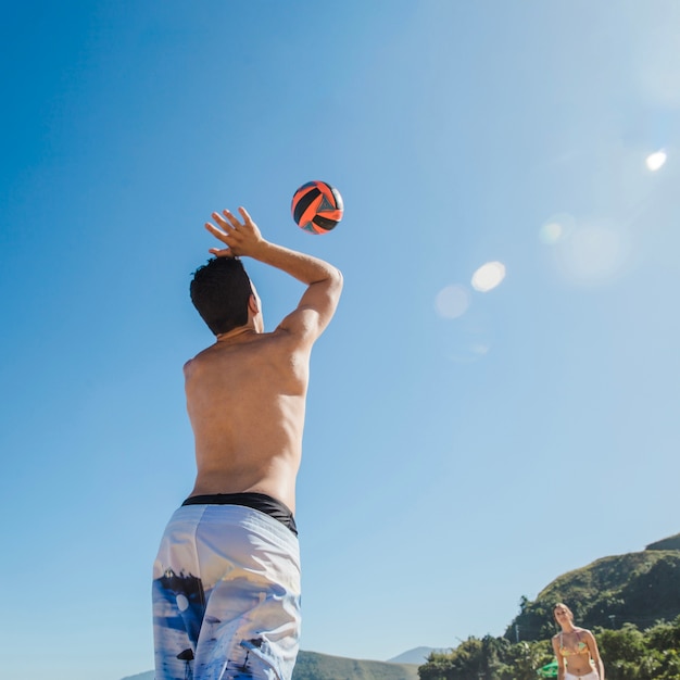 Free Photo man serving volleyball