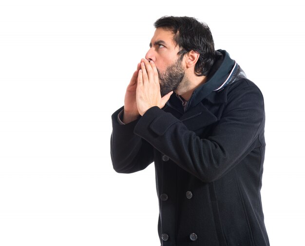 Man shouting over white background