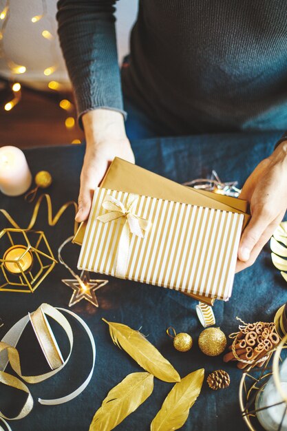 Man showing wrapped gifts