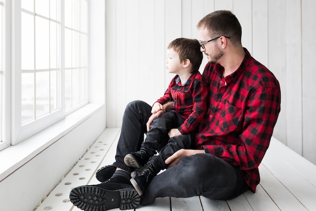 Man sitting with son on fathers day