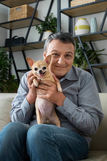 Man spending time with dog at home