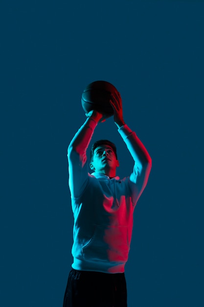 Man in sportswear playing basketball