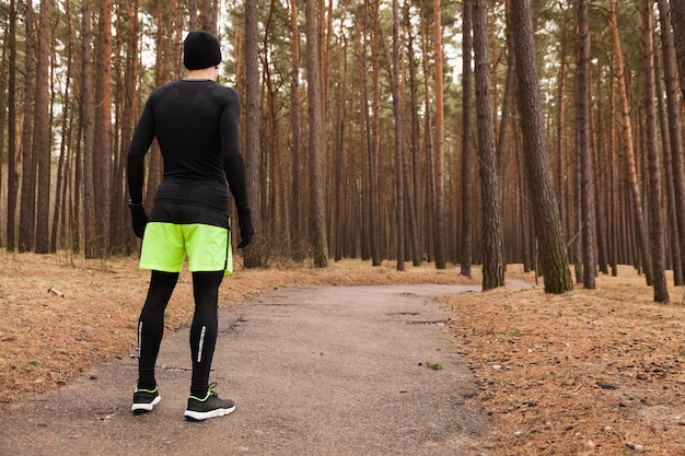 Man standing in woods