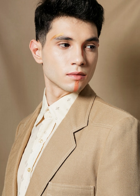 Man in suit posing and looking away