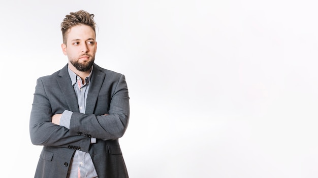 Man in suit with arms crossed