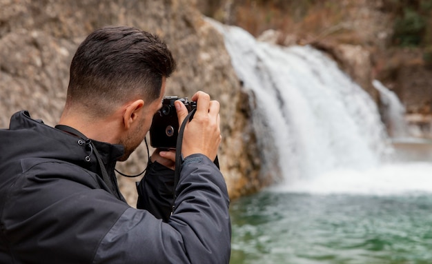 Man taking photos of nature