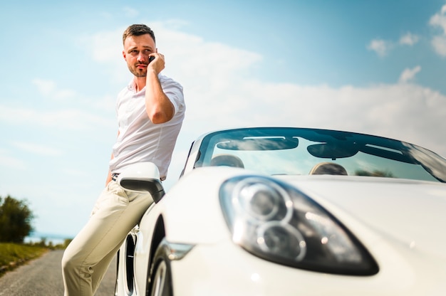 Man talking on the phone outdoors