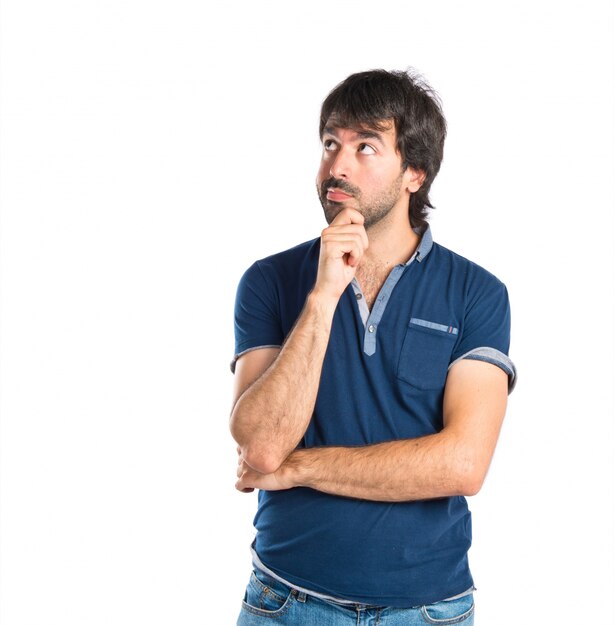 Man thinking over isolated white background