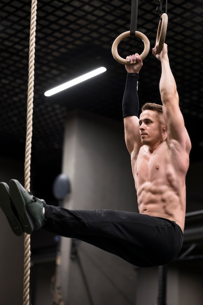 Man training on rings