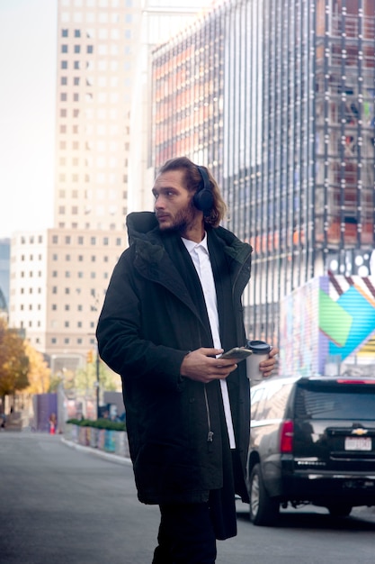 Man traveling through city using gps