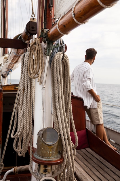 Free Photo man travelling by boat in san sebastian