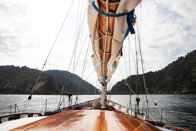 Free Photo man travelling by boat in san sebastian