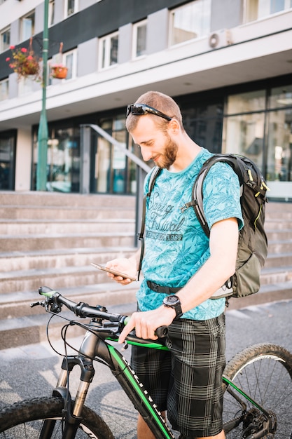 Free photo man using bike