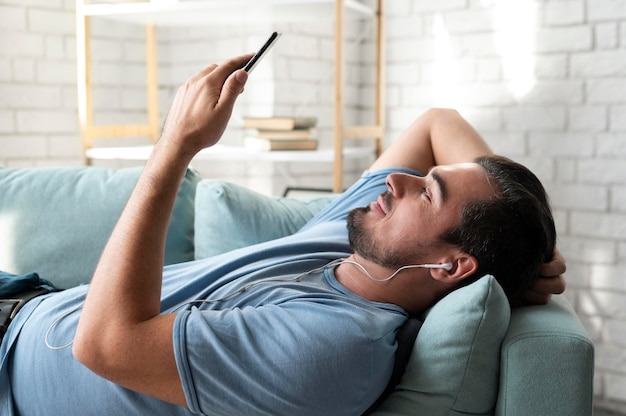 Man using a digital assistant on his smartphone