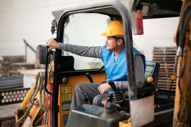 Man using an excavator for digging on day light