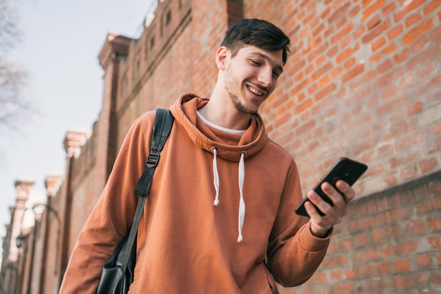 Man using his mobile phone.