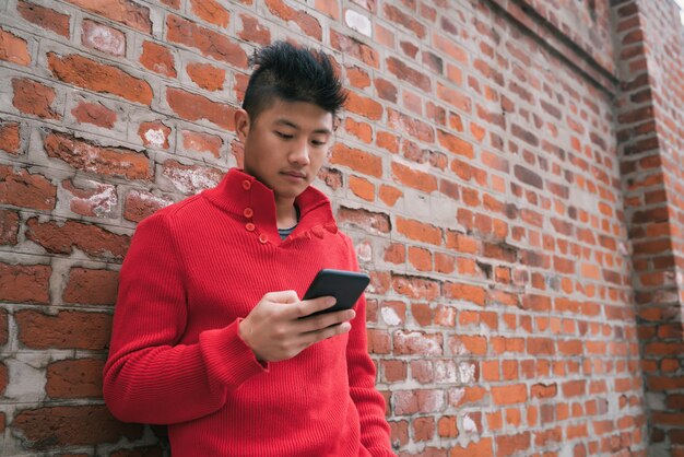 Man using his mobile phone.