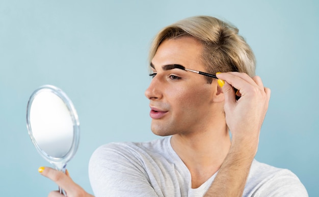 Man using make-up cosmetics