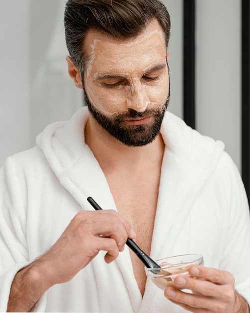 Man using natural ingredients for a face mask