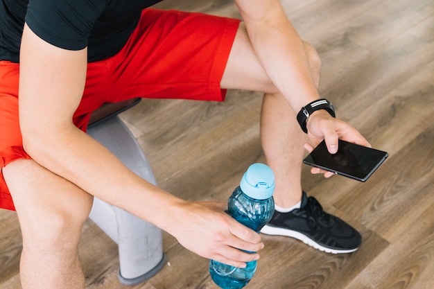 Man using phone after training