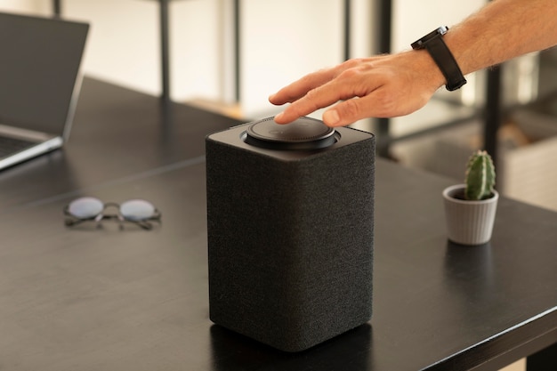 Man using a smart speaker