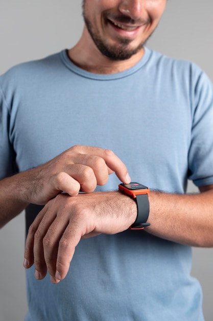 Man using a smartwatch with a digital assistant