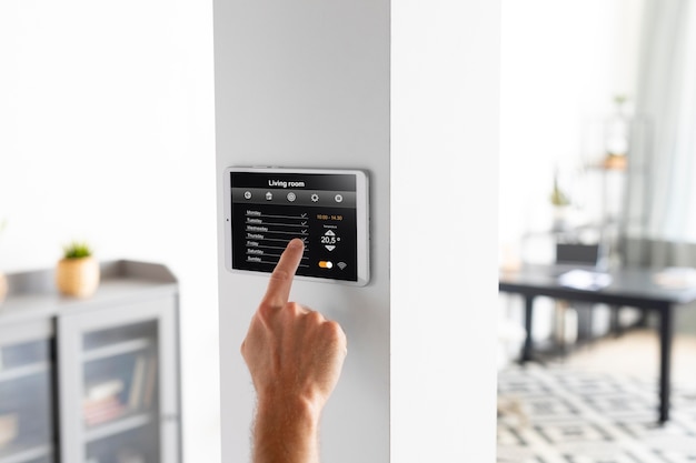 Man using a tablet in his smart home