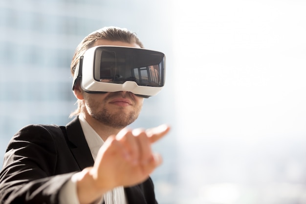 Man in VR headset using gestures in simulation