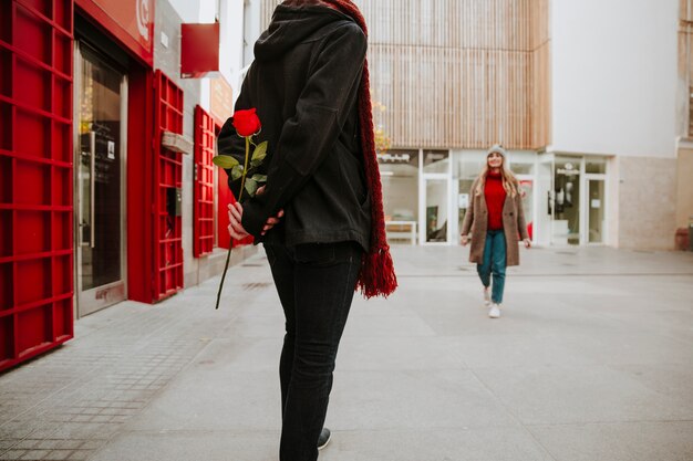 Man waiting for girlfriend on street