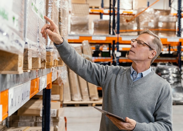 Free Photo man in warehouse working