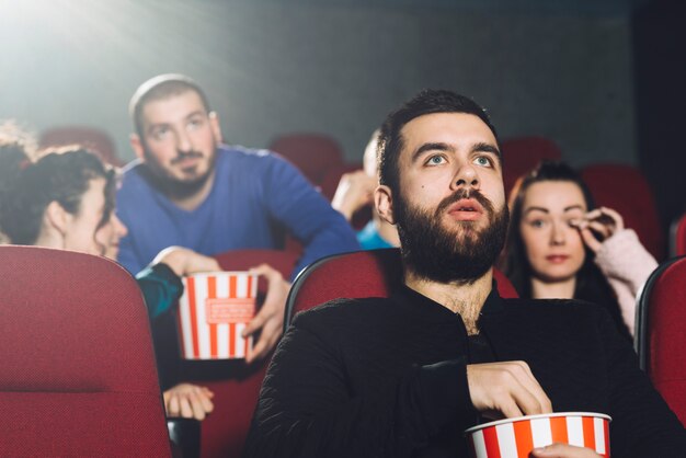 Man watching interesting film