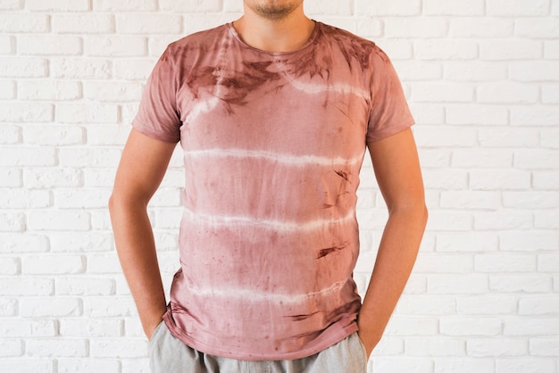 Man wearing abstract natural pigmented t-shirt