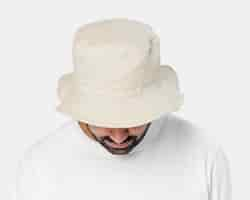 Free photo man wearing bleached bucket hat, front view