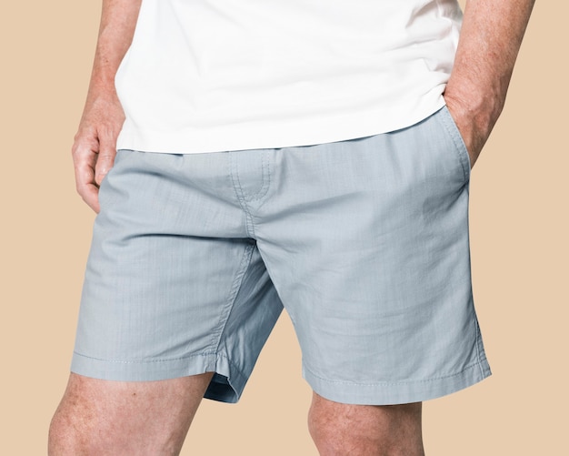 Free photo man wearing blue shorts close-up