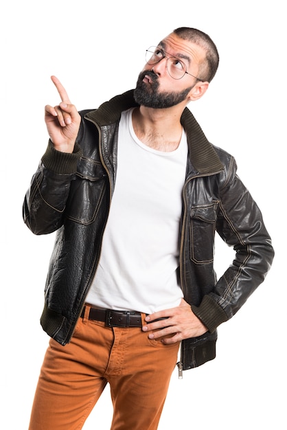 Man wearing a leather jacket thinking