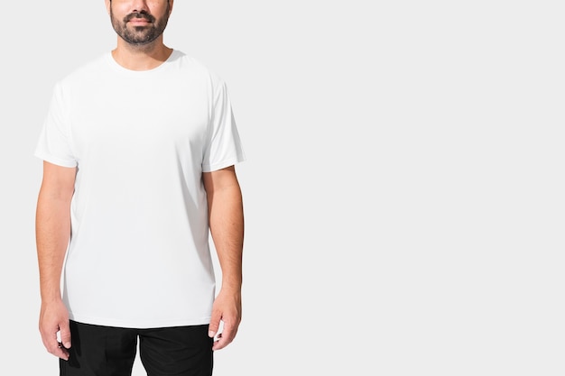 Free Photo man wearing minimal white t-shirt