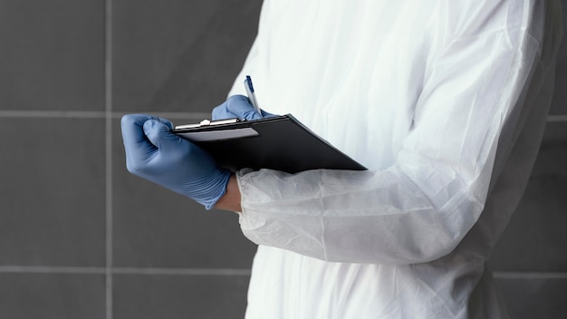 Man wearing a protective equipment against a bio-hazard