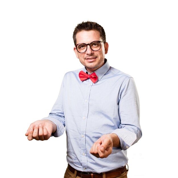 Man wearing a red bow tie. Looking confident.