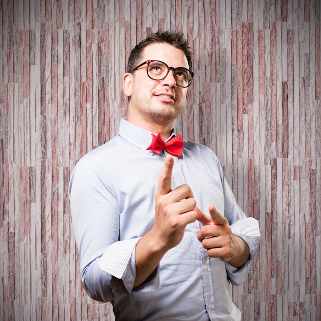 Free photo man wearing a red bow tie. looking confident.