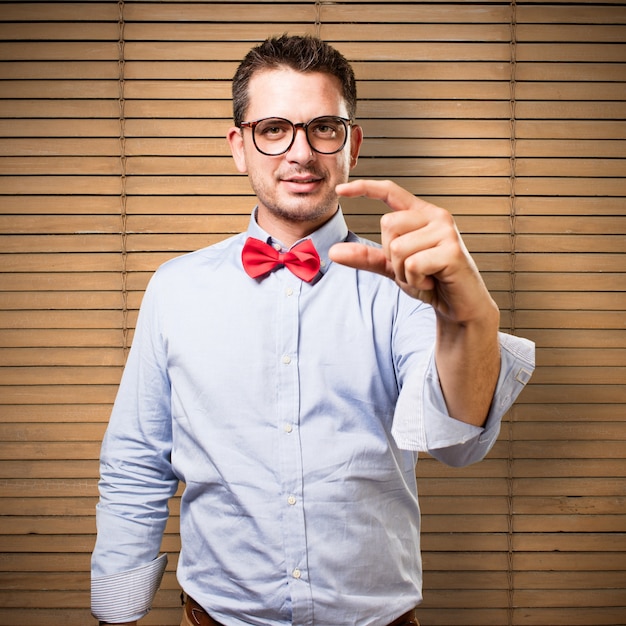 Free Photo man wearing a red bow tie.