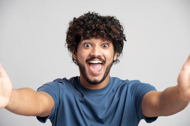 Man wearing t shirt gesturing