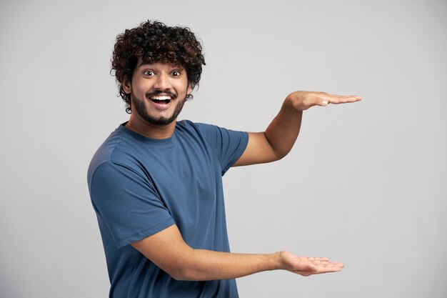 Man wearing t shirt gesturing