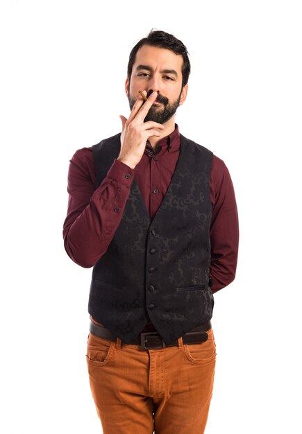 Man wearing waistcoat smoking