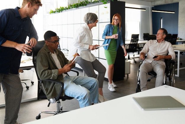 Man in a wheelchair having an inclusive office job