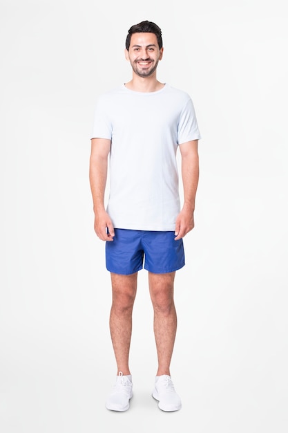 Free Photo man in white t-shirt and blue shorts with design space full body