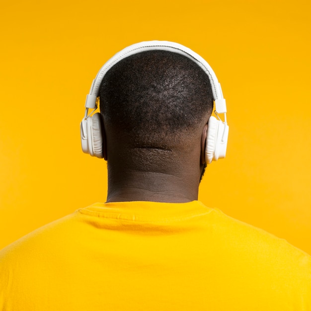 Man with back and headphones