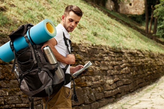 Man with backpack traveling alone